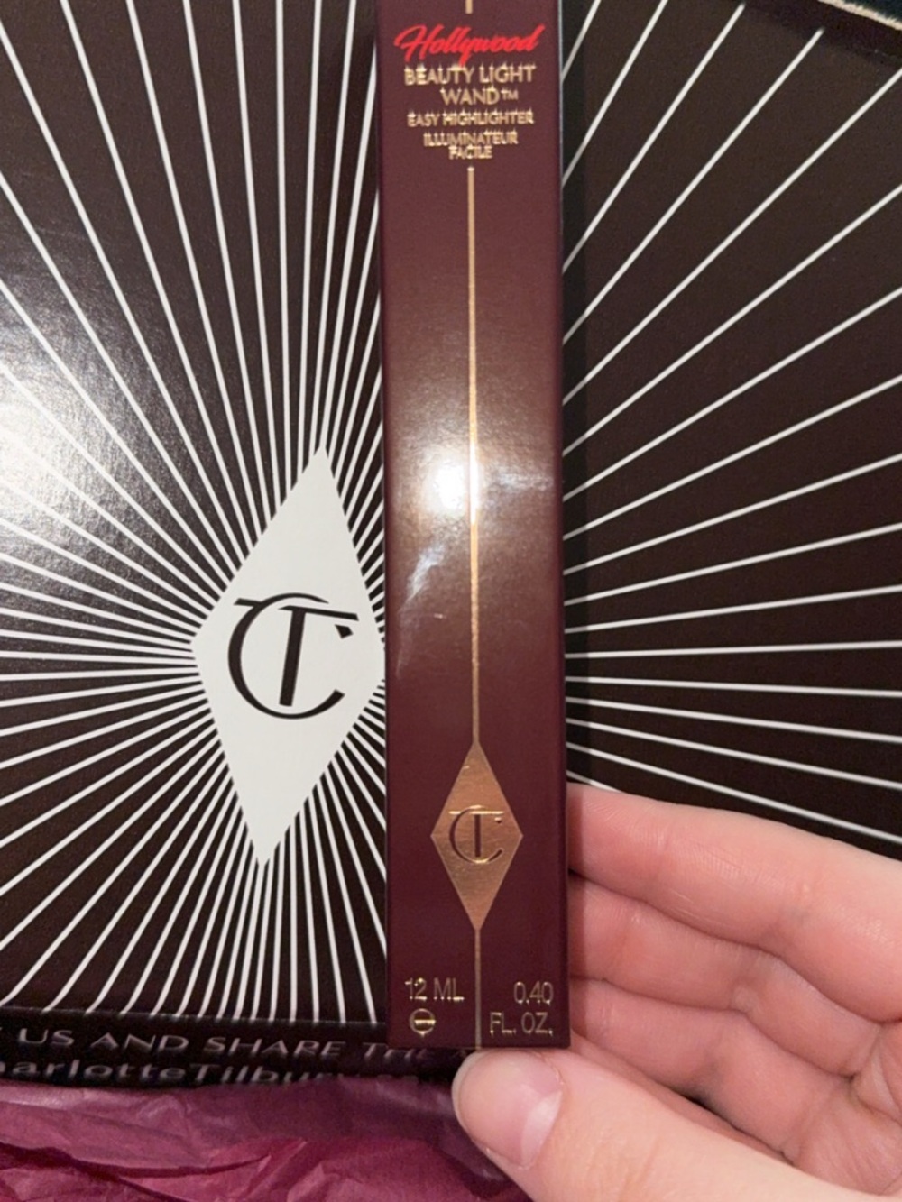 Charlotte Tilbury Spotlight Highlighter - Gold and Burgundy Packaging